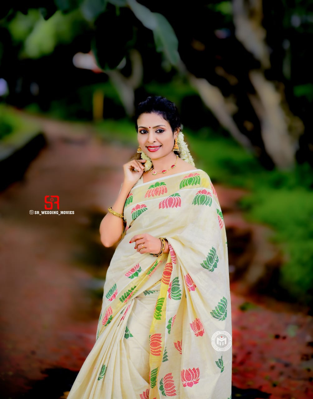 Kerala Trending multi colour lotus flower design mural printed golden tissue saree