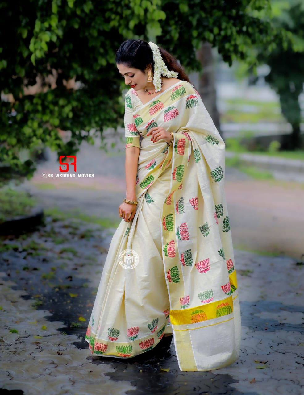 Kerala Trending multi colour lotus flower design mural printed golden tissue saree